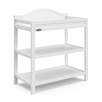 Graco Clara Changing Table (White) - GREENGUARD Gold Ceritifed, Includes Bonus Water-Resistant Changing Table Pad with Safety Strap, 2 Open Shelves