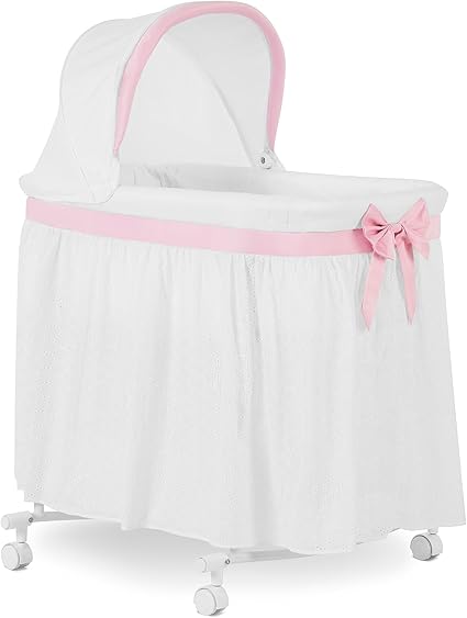 Dream On Me Montreal Portable 2-in-1 Convertible Baby Bassinet in Pink, Adjustable Canopy, Large Storage Area, Rocking Bedside Bassinet with Lockable Wheels.